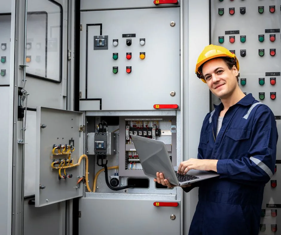 Electrician working on Electrical Metering for Load Forecasting