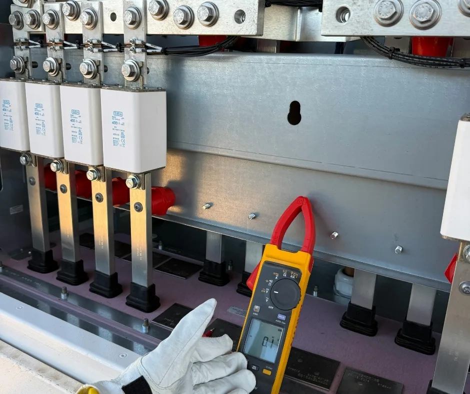 Clamp meter used for electrical load testing as part of an arc flash study on industrial equipment